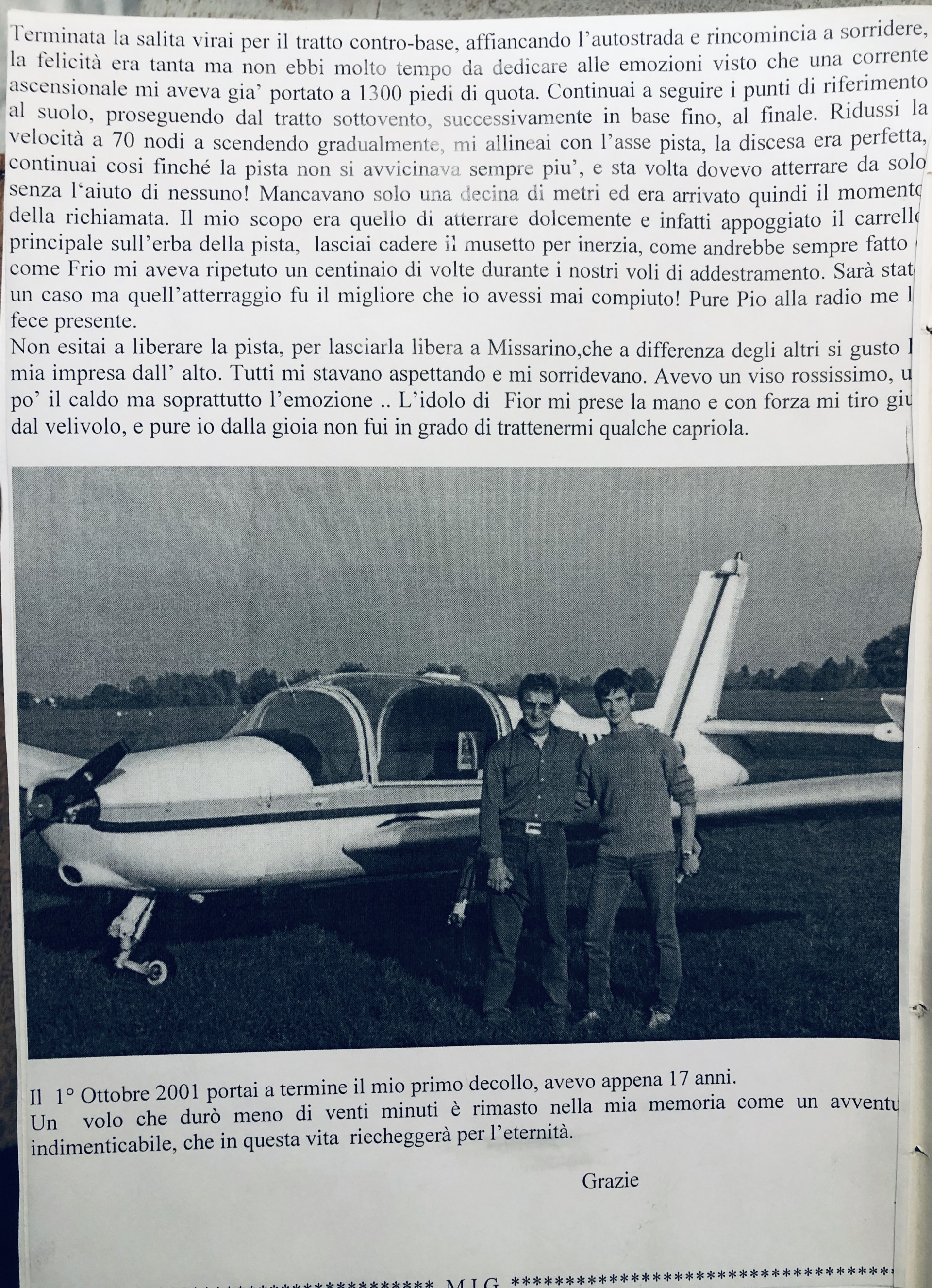 An early flying memory: two young men standing beside a light aircraft