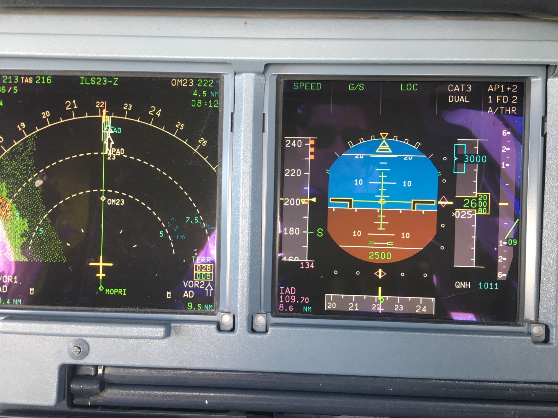 Close-up of navigation and flight instruments during an approach